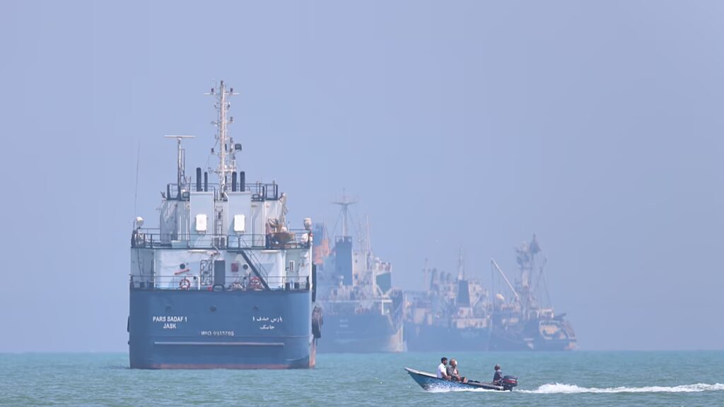 Cargo ship hit by projectile in Hormuz as Iran issues renewed passage warning