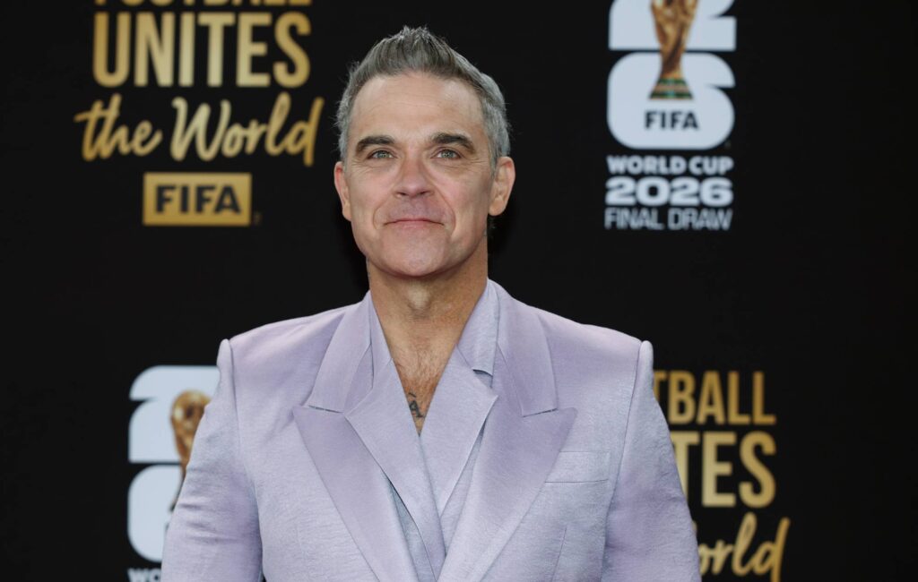 Robbie Williams responds to claims cocaine fell from his face onto microphone during World Cup TV interview Robbie Williams responds to claims cocaine fell from his face onto microphone during World Cup TV interview