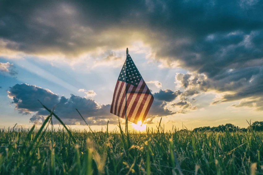 US crimes against Mexico from an immigrant’s perspective American flag waving in the breeze