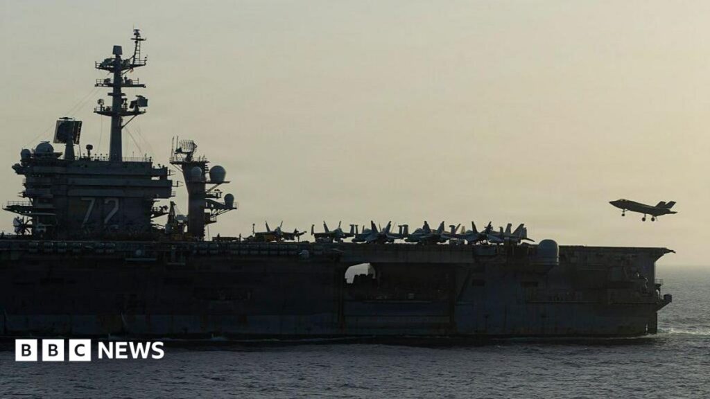 Concern grows over conditions on USS Abraham Lincoln Side view of USS Abraham Lincoln as a small jet lands on it