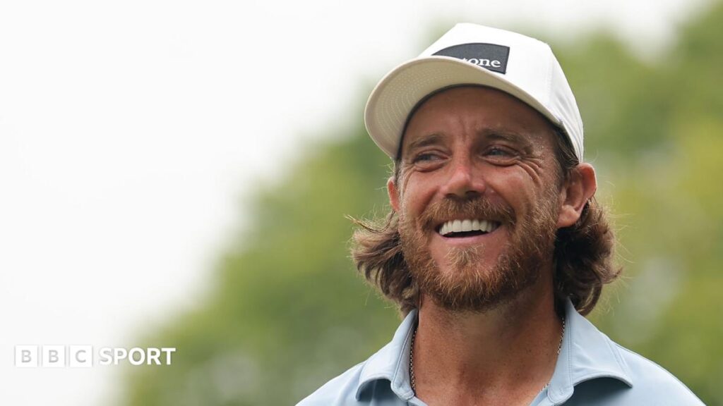 Tommy Fleetwood smiles on the first tee
