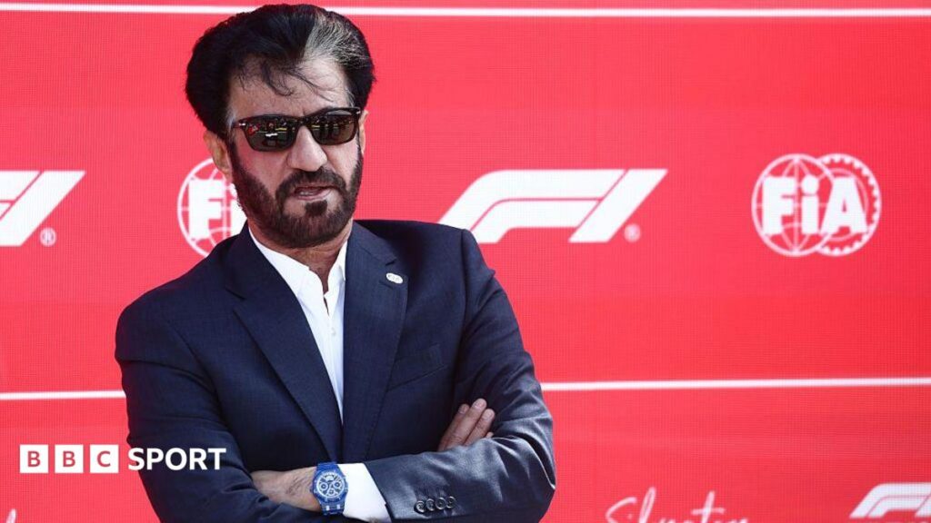 Mohammed ben Sulayem in sunglasses against a F1 background