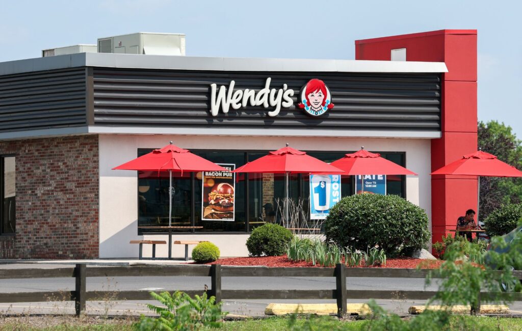 Wendy’s shares new emo EP featuring members of Silverstein, Memphis May Fire and more The Wendy's logo is seen on the outside of the fast food restaurant