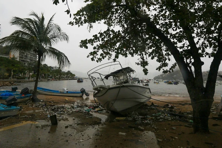 Mexico’s week in review: An unauthorized police academy stirs a security row with US as triple storm threat keeps coasts on alert The cloud bands from Hurricane Simon have brought heavy rain to the port of Acapulco.